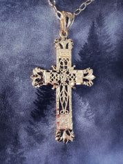 Croix "Etincelle" en or jaune 18 carats, finition ajourée