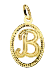 Pendentif ou jeton "Oméga", lettre stylisée ajourée en or jaune 18 carats