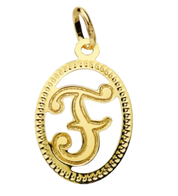 Pendentif ou jeton "Oméga", lettre stylisée ajourée en or jaune 18 carats