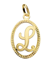 Pendentif ou jeton "Oméga", lettre stylisée ajourée en or jaune 18 carats