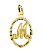 Pendentif ou jeton "Oméga", lettre stylisée ajourée en or jaune 18 carats