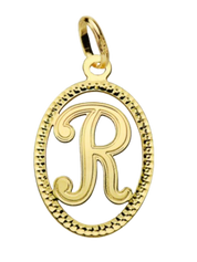 Pendentif ou jeton "Oméga", lettre stylisée ajourée en or jaune 18 carats