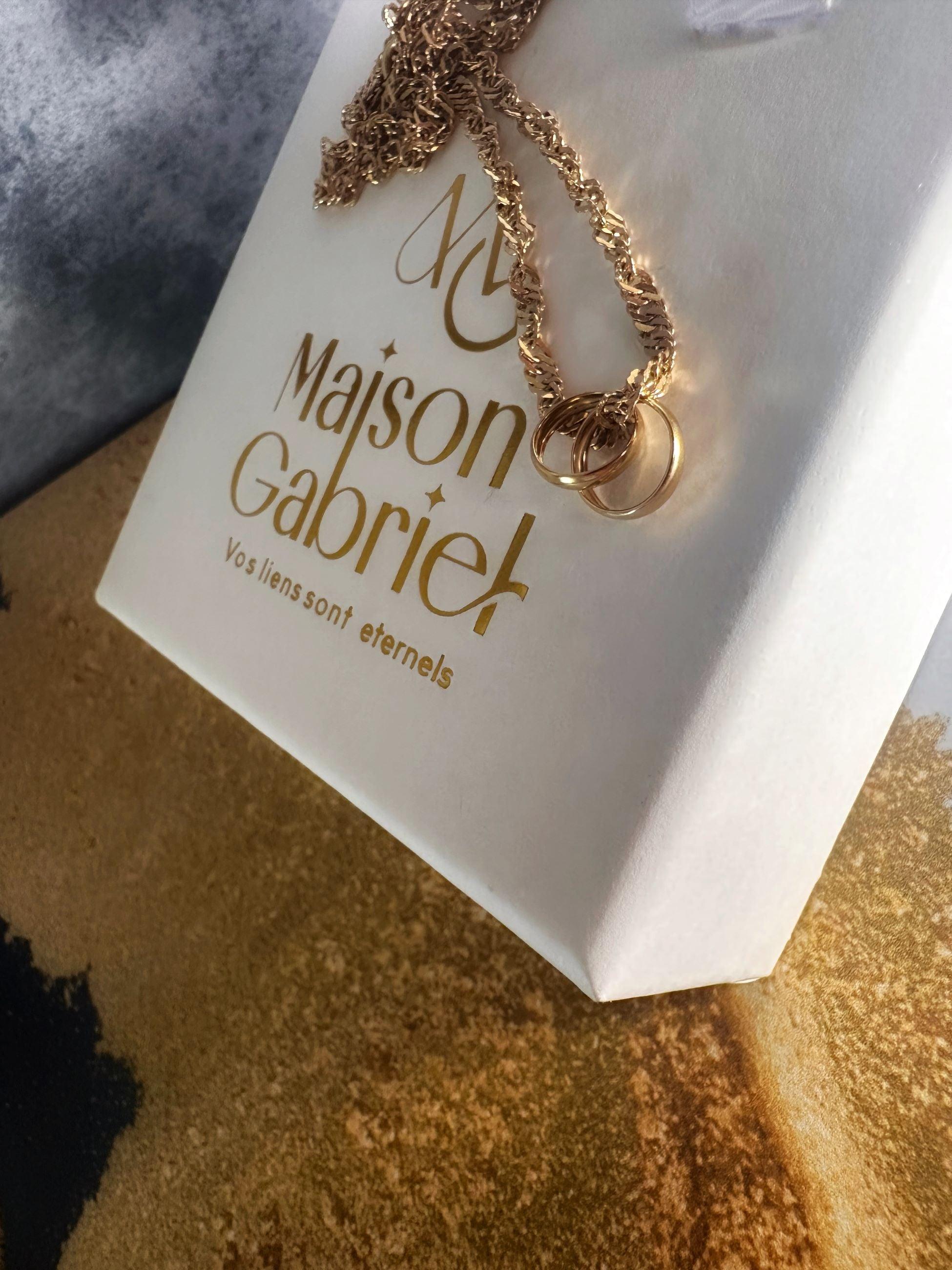 Pendentif "Eternelle Etreinte", alliances enlacées en or 18 carats - Maison Gabriel