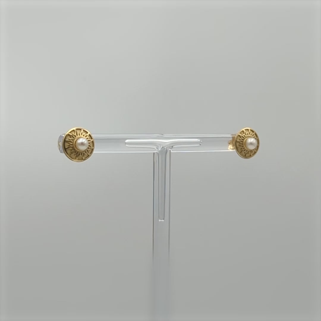 Boucles d'Oreilles "Astrée" en or jaune 18 carats et perle centrale